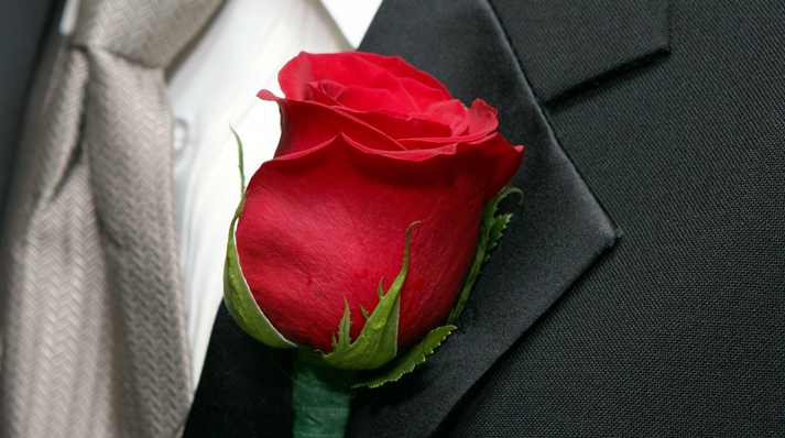 Bud vases and boutonnieres are  meaningful tokens of remembrance, featuring roses available in a variety of colors.