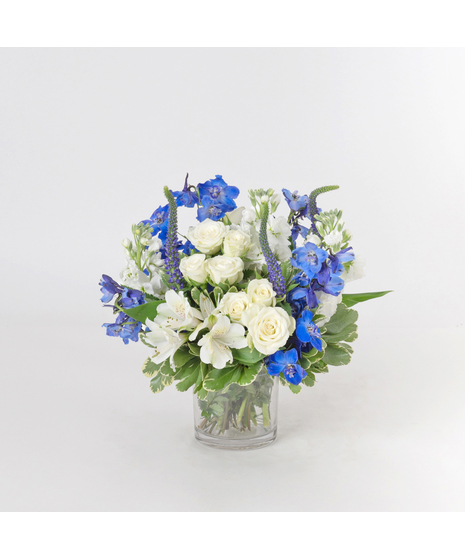 Our Peaceful Winter arrangement captures the serene beauty of the season 