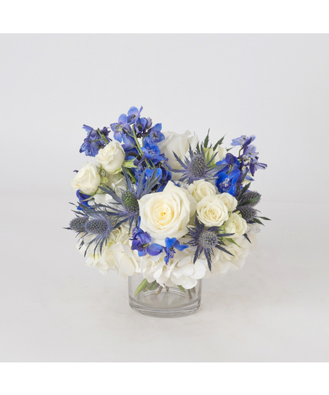 Celebrate the season with the Nutcracker arrangement, a timeless display of winter elegance. 