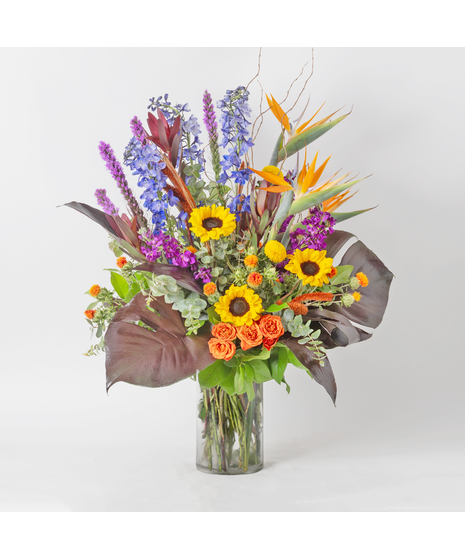 Autumn Enchantment is a tall, elegant fall arrangement designed in a 6x10