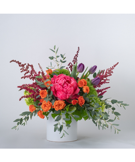 A vibrant collection of garden flowers will definitely make a statement on anyone's table!