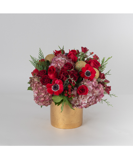 Celebrate the season with the Nutcracker arrangement, a timeless display of winter elegance. 