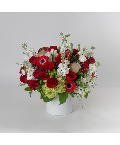 Celebrate the season with the Nutcracker arrangement, a timeless display of winter elegance. 