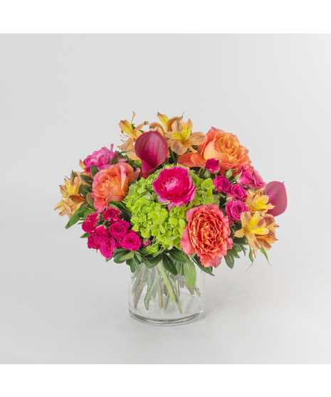Love Bonfire is a bold and fiery Valentine’s Day flower arrangement bursting with vibrant color and modern romance.