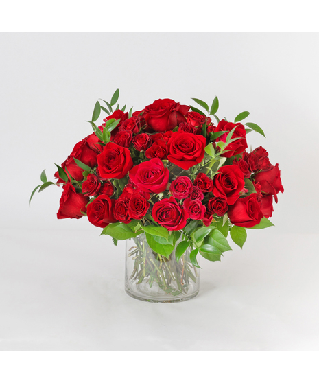 Rose Romance is a classic and elegant Valentine’s Day rose arrangement designed to speak the language of love. 