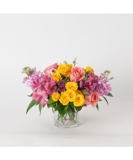 Sweetberry Sun is a cheerful and romantic arrangement that blends soft, sun-kissed hues with delicate texture.