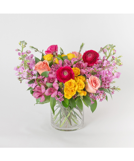Sweetberry Sun is a cheerful and romantic arrangement that blends soft, sun-kissed hues with delicate texture.